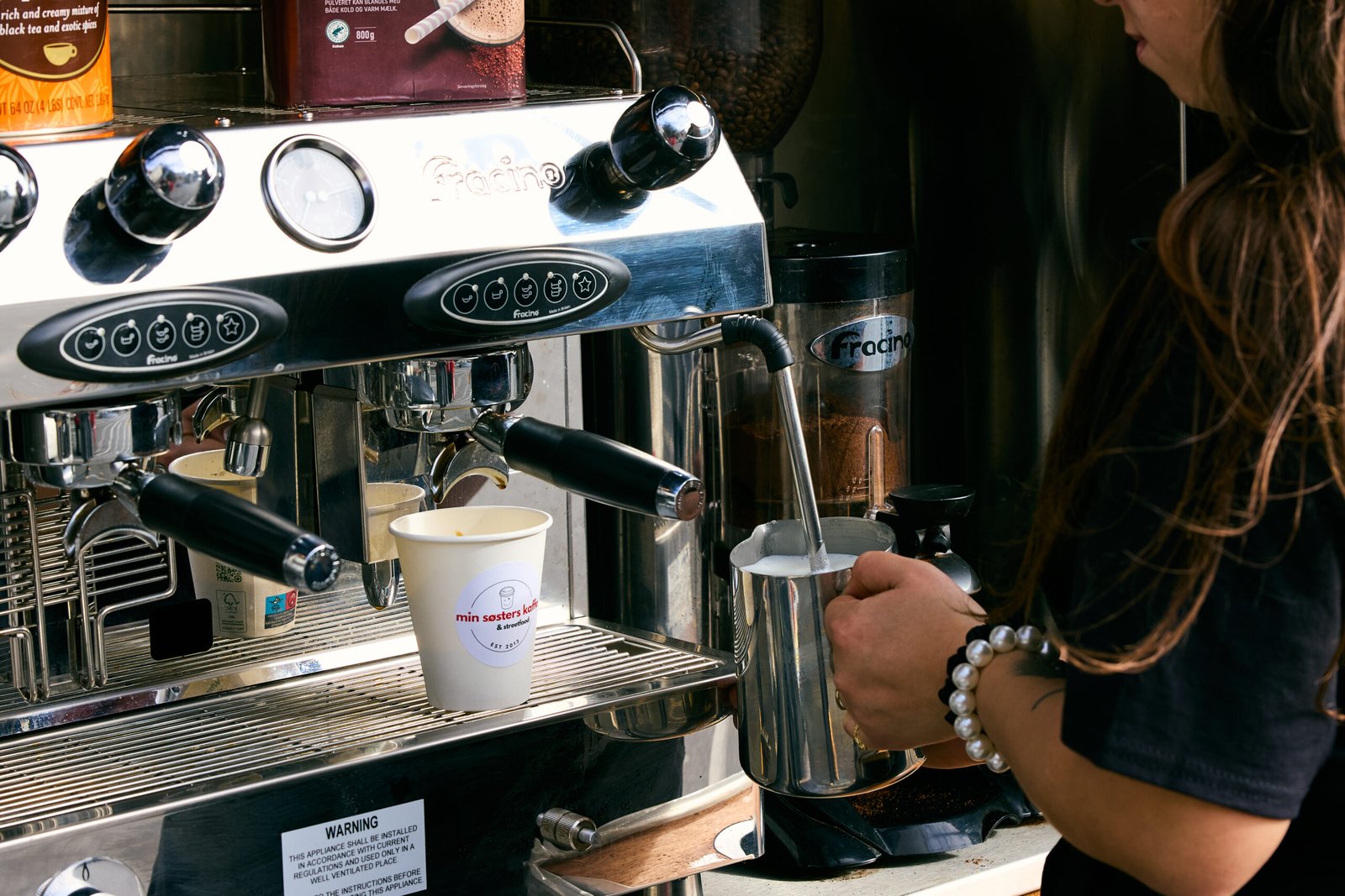 AI-generated placeholder: a barista hands a cup of coffee to a guest.
